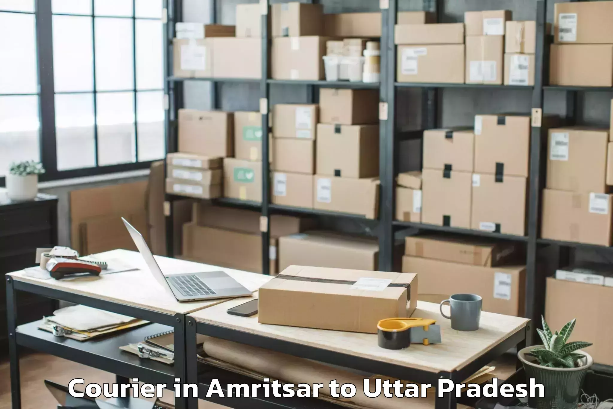 Leading Amritsar to Katghar Lalganj Courier Provider